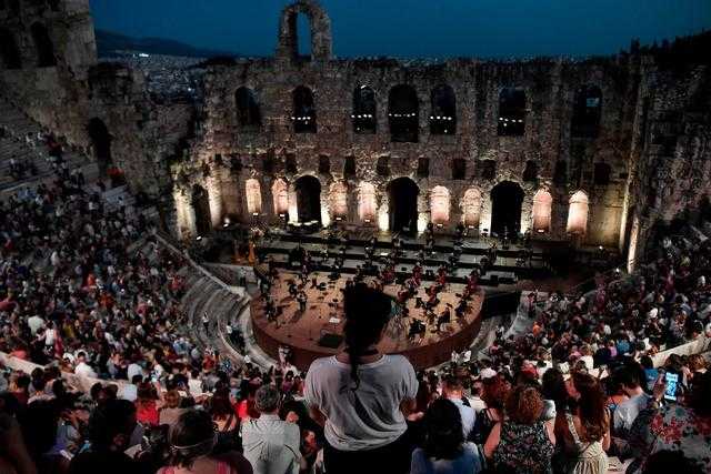 The Greek National Opera performing at the Herodus Atticus ancient theatre at the foot of the Acropolis last month(AFPGetty)