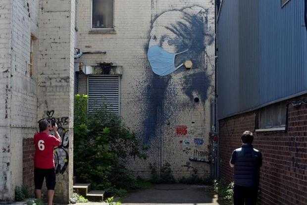 Banksy - The Girl with the Pierced Eardrum, Bristol, Britain, April 23, 2020